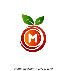 M letter fruit logo with green leaf and gradient. M Letter Orange logo design.M letter circle fruit logo design.Leaf and fruit logo with M letter