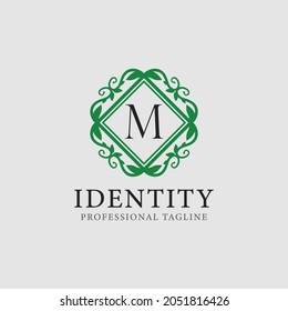 M letter leaf monogram logo and text badge emblem -  vector image
