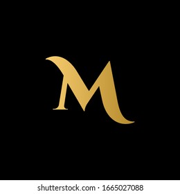 M letter logo with black background.The gold letter icon.Gold letter icon design.