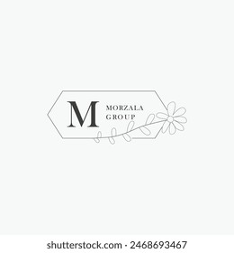 Logotipo de la letra M con un concepto floral creativo para el Vector premium de los bienes raíces de la belleza del negocio de la compañía