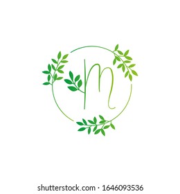 M letter logo vector design. M Icon eco green and circle concept template. M vector set of green eco letters logo with leaves. M alphabet of green leaves isolated on white background. Floral Alphabet.