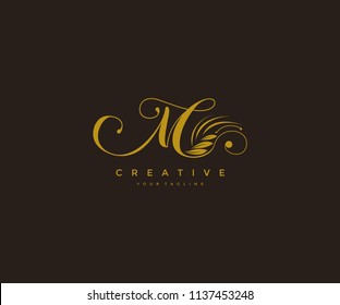 M letter luxury flourishes ornament logo