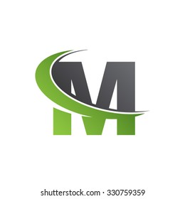 M letter swoosh green logo