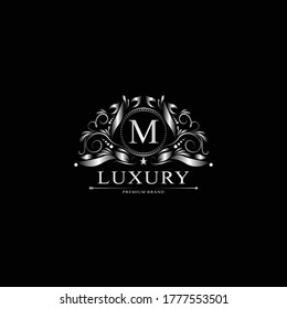 M Logo De Lujo. La plantilla florece con líneas caligráficas elegantes de adorno. Signo de negocio, identidad para Restaurante, Royalty, Boutique, Cafe, Hotel, Heraldic, Joyería, Moda y otras ilustraciones vectoriales