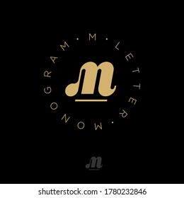 M monogram into circle. M logo. Gold M monogram, isolated on black background. Logo can be used for web, business, clothes or sports.