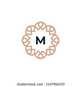 M Ornament Logo Design
