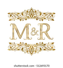 M and R vintage initials logo symbol. The letters are surrounded by ornamental elements. Wedding or business partners monogram in royal style.