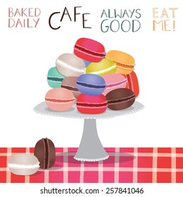 Macaroons on a table, on white with handwriting labels.