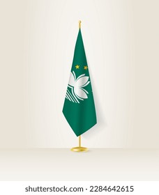 Macau flag on a flag stand. Vector illustration.