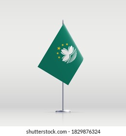 Macau flag state symbol isolated on background national banner. Greeting card National Day of the Macao Special Administrative Region People's Republic of China. banner realistic state flag of MSAR.