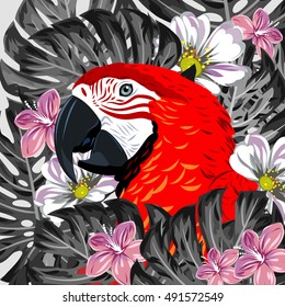 Macaw parrot in thickets of tropical leaves and flowers