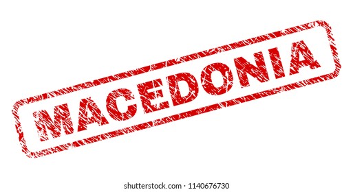 MACEDONIA stamp seal print with grunge style. Red vector rubber print of MACEDONIA text with scratched texture. Text title is placed inside rounded rectangle frame.
