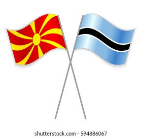 Macedonian and Motswana crossed flags. Macedonia combined with Botswana isolated on white. Language learning, international business or travel concept.