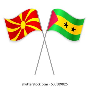 Macedonian and Sao Tomean crossed flags. Macedonia combined with Sao Tome and Principe isolated on white. Language learning, international business or travel concept.