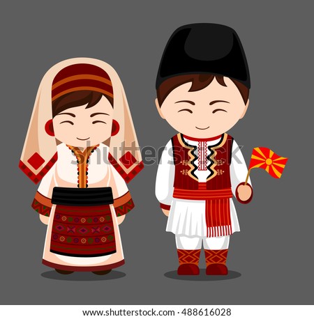 Macedonians in national dress with a flag. Man and woman in traditional costume. Travel to Macedonia. People. Vector flat illustration.