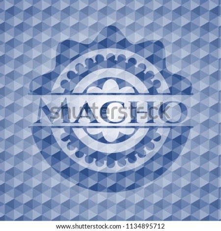 Macho blue badge with geometric pattern background.