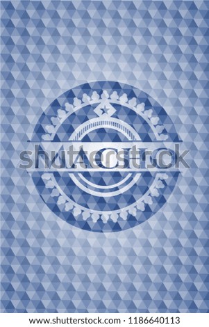 Macho blue emblem or badge with abstract geometric pattern background.