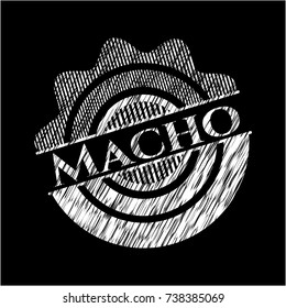 Macho written on a blackboard
