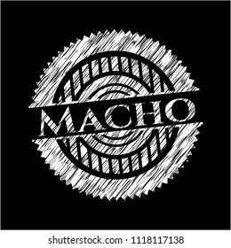 Macho written on a chalkboard