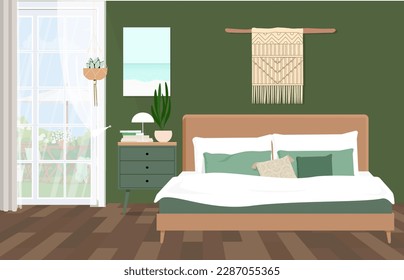 Macrame decoration hanging on green wall above bed in bedroom