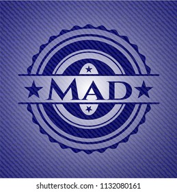Mad badge with denim background