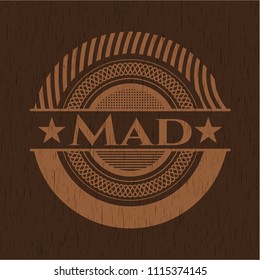 Mad wooden emblem