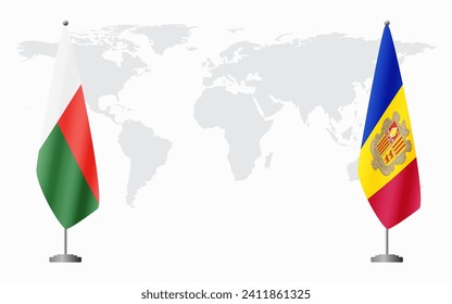 Madagascar and Andorra flags for official meeting against background of world map.