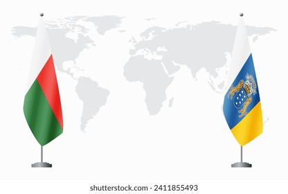 Madagascar and Canary Islands flags for official meeting against background of world map.