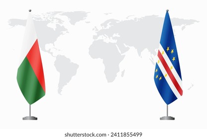 Madagascar and Cape Verde flags for official meeting against background of world map.