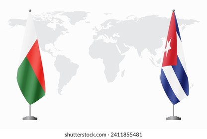 Madagascar and Cuba flags for official meeting against background of world map.