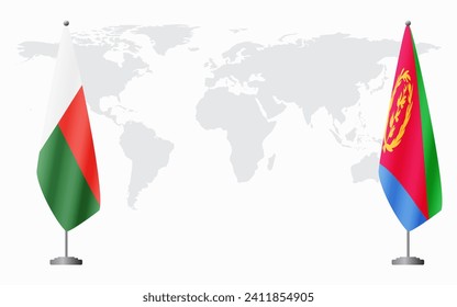 Madagascar and Eritrea flags for official meeting against background of world map.