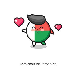 madagascar flag badge character cartoon with kissing gesture , cute design