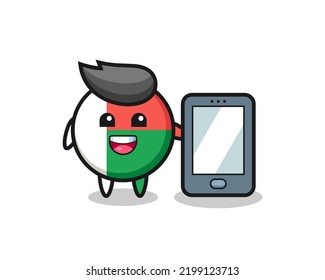 caricatura de ilustración de la bandera de madagascar sosteniendo un smartphone, diseño lindo
