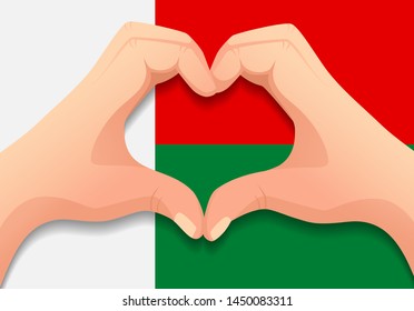 Madagascar flag and hand heart shape. Patriotic background. National flag of Madagascar vector illustration