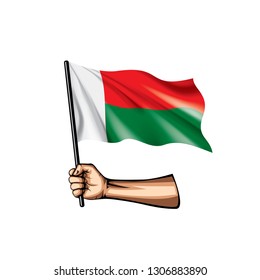 Madagascar flag and hand on white background. Vector illustration