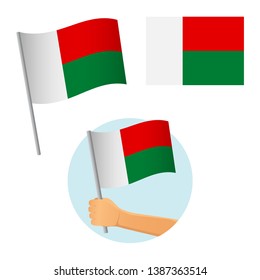 Madagascar flag in hand. Patriotic background. National flag of Madagascar vector illustration