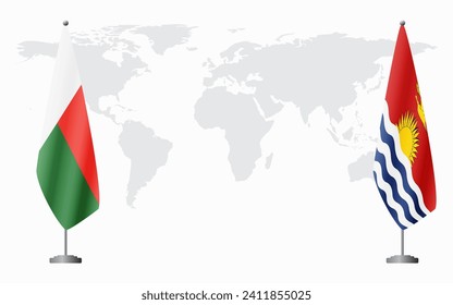 Madagascar and Kiribati flags for official meeting against background of world map.