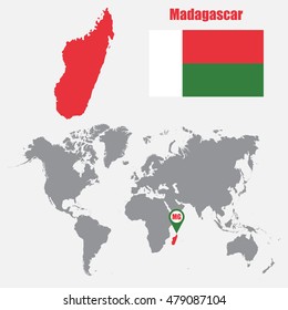 Madagascar map on a world map with flag and map pointer. Vector illustration
