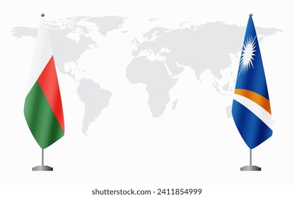 Madagascar and Marshall Islands flags for official meeting against background of world map.