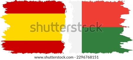 Madagascar and Spain grunge flags connection, vector