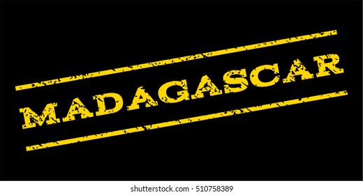 Madagascar watermark stamp. Text tag between parallel lines with grunge design style. Rubber seal stamp with scratched texture. Vector yellow color ink imprint on a blue background.