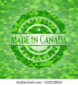 Made in Canada realistic green emblem. Mosaic background