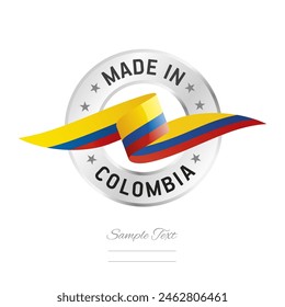 Hecho en Colombia. Cinta de la bandera de Colombia con el icono del sello del anillo de plata circular. Vector de la etiqueta del signo de Colombia aislado sobre fondo blanco