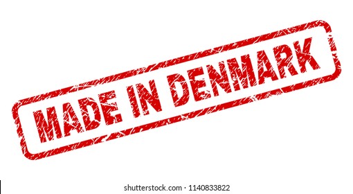 MADE IN DENMARK stamp seal print with grunge style. Red vector rubber print of MADE IN DENMARK text with grunge texture. Text label is placed inside rounded rectangle frame.