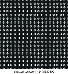Made of dots with white flower seamless black and white background