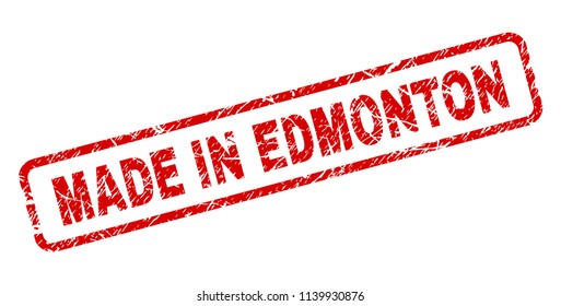 MADE IN EDMONTON stamp seal imprint with grunge style. Red vector rubber print of MADE IN EDMONTON text with unclean texture. Text caption is placed inside rounded rectangle frame.