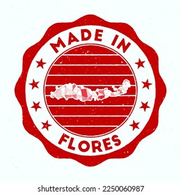 Made In Flores. Island round stamp. Seal of Flores with border shape. Vintage badge with circular text and stars. Vector illustration.