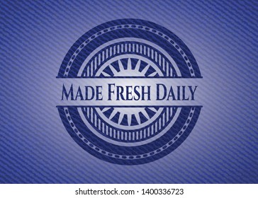 Made Fresh Daily badge with denim texture. Vector Illustration. Detailed.