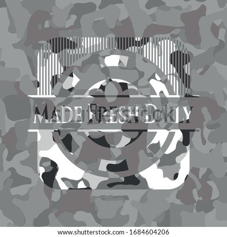 Made Fresh Daily on grey camouflaged texture