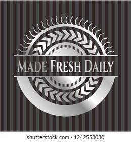 Made Fresh Daily silver emblem or badge